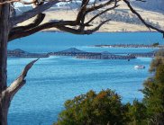 Long distance photo of a fish farm at North Bruny, Bruny Island, Tasmania (Image: Liese Coulter).