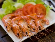 A plate of cooked prawns