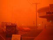 A dust storm turns the sky red in Mildura, Victoria.  Photo: A Nairn