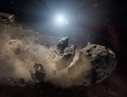 An artist's impression of an asteroid breaking up. Credit: NASA/JPL-Caltech