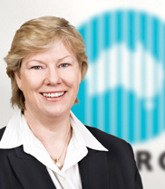 Portrait photo of Dr Megan Clark with CSIRO logo in the background.