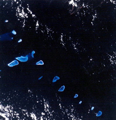 The Capricorn-Bunker group in the Great Barrier Reef Marine Park from space