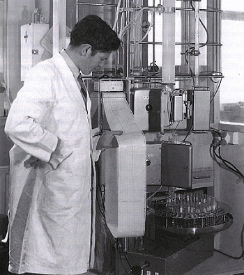 Lindsay Sparrow with one of the large columns used for the separation of wool proteins