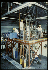 The plasma reactor during commissioning at CSIRO Division of Mineral Chemistry laboratories in Port Melbourne. On the mezzanine floor