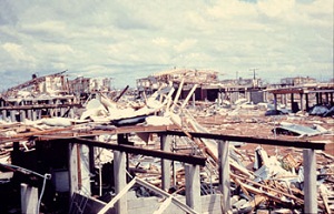 Inspecting the damage by Cyclone Tracy from the ground