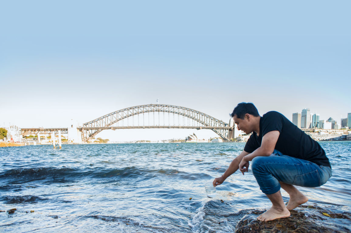 Scientist collecting water at Sydney Harbour.