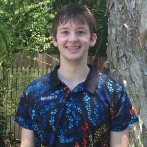 Brenton Keats standing in garden. 